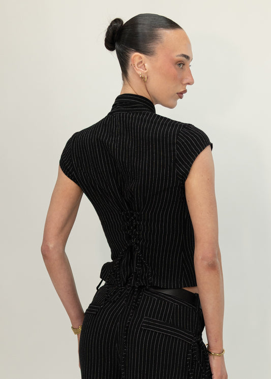 Back view of the Remi black pinstripe top showing the adjustable lace-up back